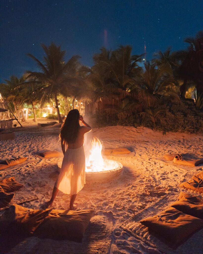 beach bonfire in Tulum Mexico at Nomade Hotel