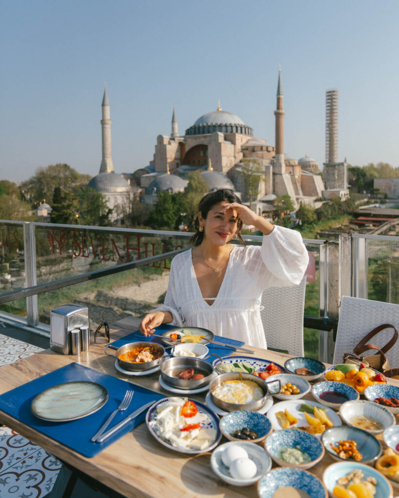 Adriana Maria with Turkish breakfast at Seven hills restaurant with views of hagia sophia 