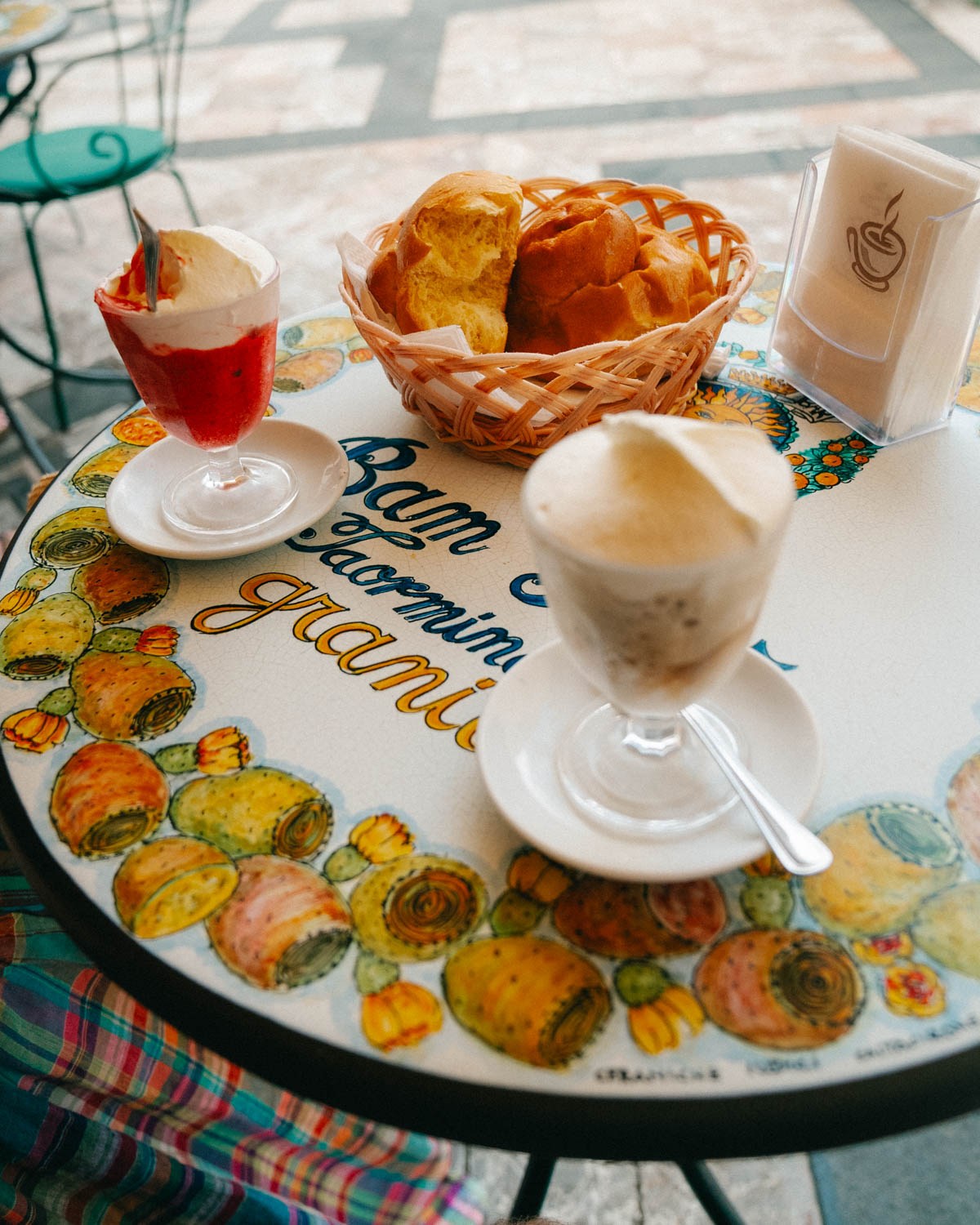 table at Bam Bar with Sicilian granitas and brioche at one of the best places to visit in Sicily - Taormina