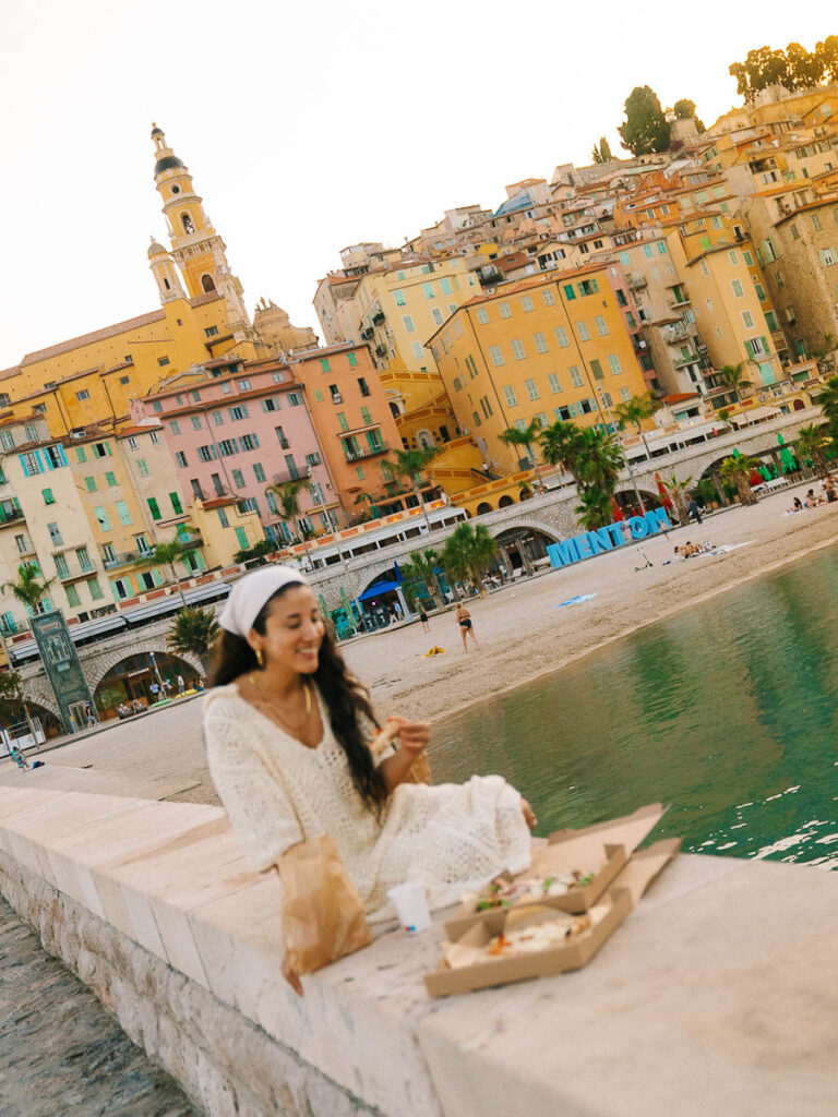 Eating pizza by the sea in Menton France