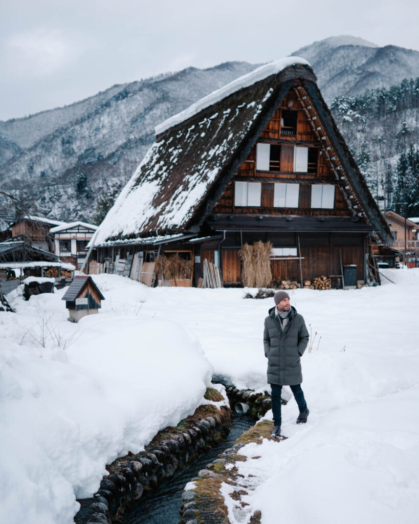 a traditional farm house covered in snow in the japanese alpine region of Gifu