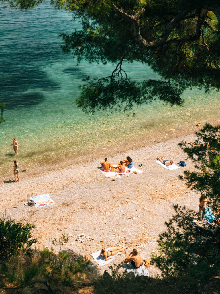 Bathers at Paloma beach on the French riviera during summer